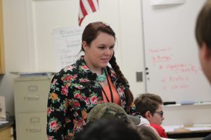 Science teacher Chelsea Berg talks with her 4th hour biology students. Part of the discussion for the hour on Apr. 14 centered around the use of cell phones in class.
