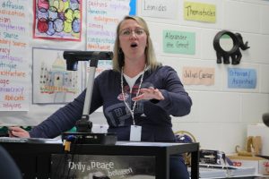 Social studies teacher Kimberly Outinen explains an essay layout to her 6th hour history class on April 22. The essay topic was the french revolution.