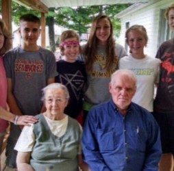 Mary Bopp, Mike, Lauren Cubberley, Liv Schmelzer, Allison Wood, and sophomore Jacob Pasek pose for a photo with a couple they helped while on their mission trip in Accident, Maryland. "This is my crew," Pasek said. "We got to paint a garage for these two people in the middle. They use their garage for dinners for people who don't have food. It was an amazing experience to meet them and see what they do." Photo by Jacob Pasek.