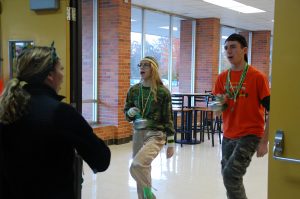 Juniors Annalise Wolhford and Ben Price help lead the marching in the halls on May 24, 2016. The band marched for the Midland vs. Dow football playoffs. They are assistant drum majors for their junior year before they become senior drum majors.